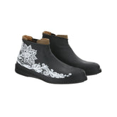 FOOTERINE Flower, un copriscarpe impermeabile in silicone con design floreale. Ideale per moto. Di TUCANO URBANO.
